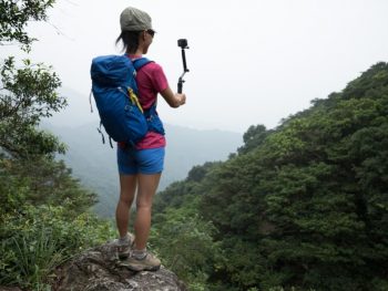 backpacker with action camera