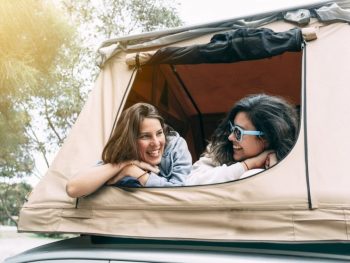 girls in a rooftop tent