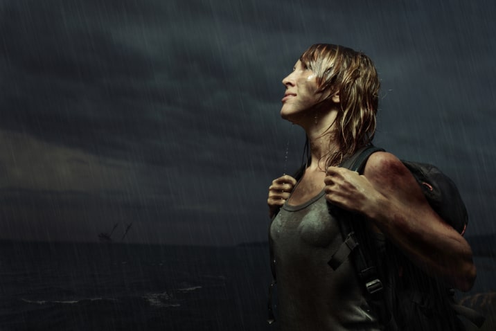 woman hiking in the rain