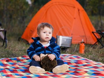 toddler at campsite