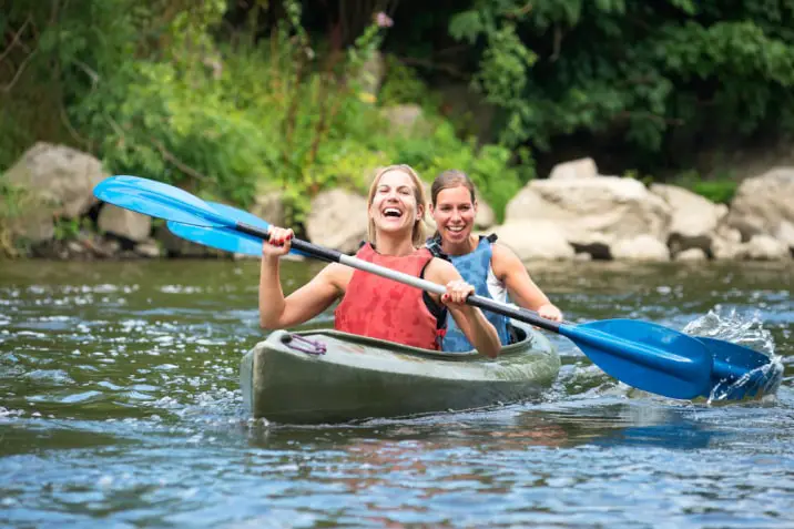 two women kayaking