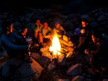 people around campfire