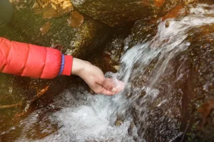 hand in stream