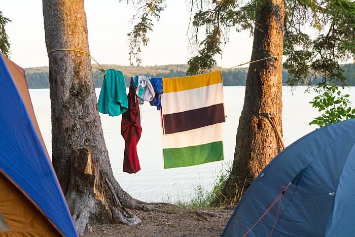 tents and a clothesline with clothes