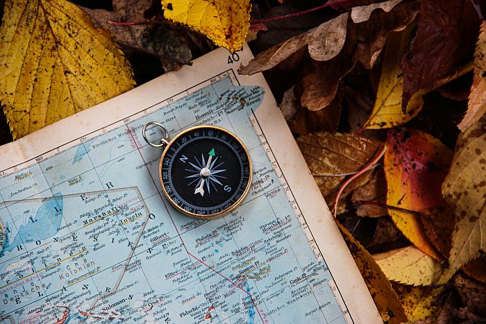 a compass and a map
