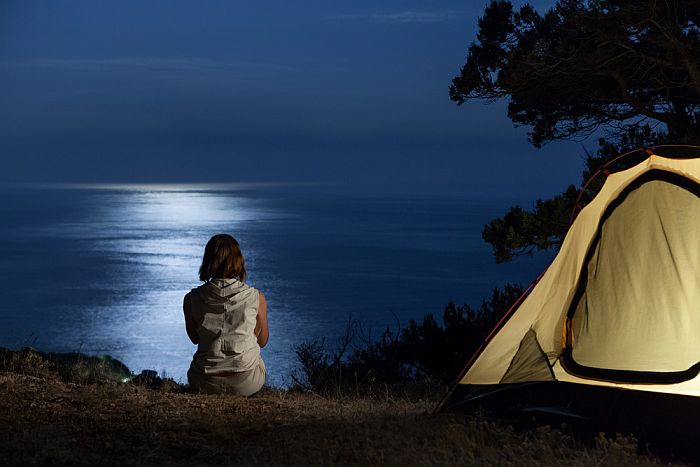 woman camping alone